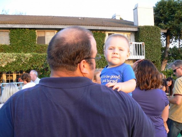 My son with me at a team function at right about one year old. My son is the most handsome kid in the world right?!  (Every parent thinks this right?!)